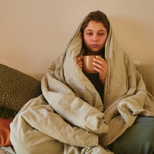 woman cold at home